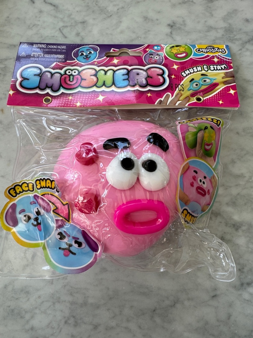 Smusher pink Squeezable Face Toy